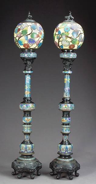 Appraisal: A pair of multi-section champleve enamel decorated lamps Meiji Period