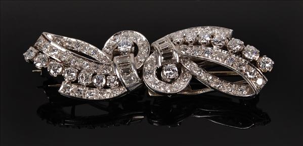 Appraisal: A diamond double clip brooch circa of stylized bow design