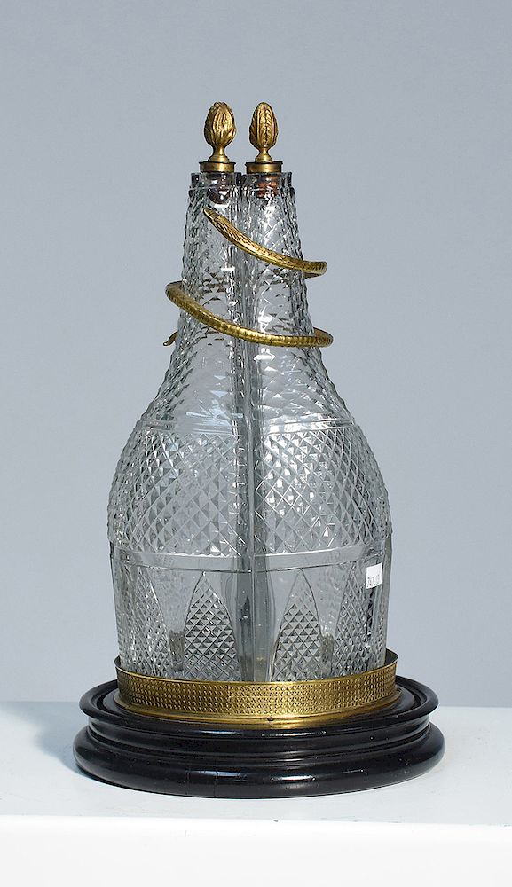 Appraisal: French mid- th C four bottle cut glass decanter set