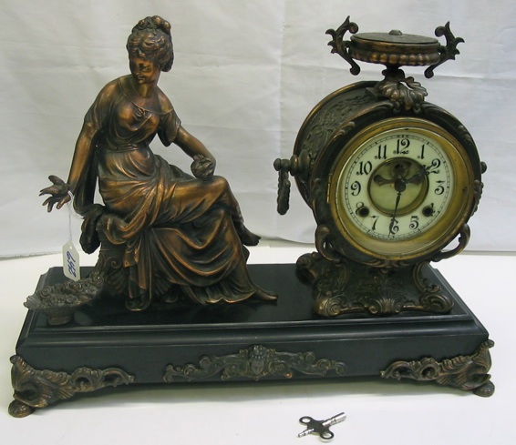 Appraisal: AN AMERICAN NEW HAVEN STATUE CLOCK having brass rimmed porcelain