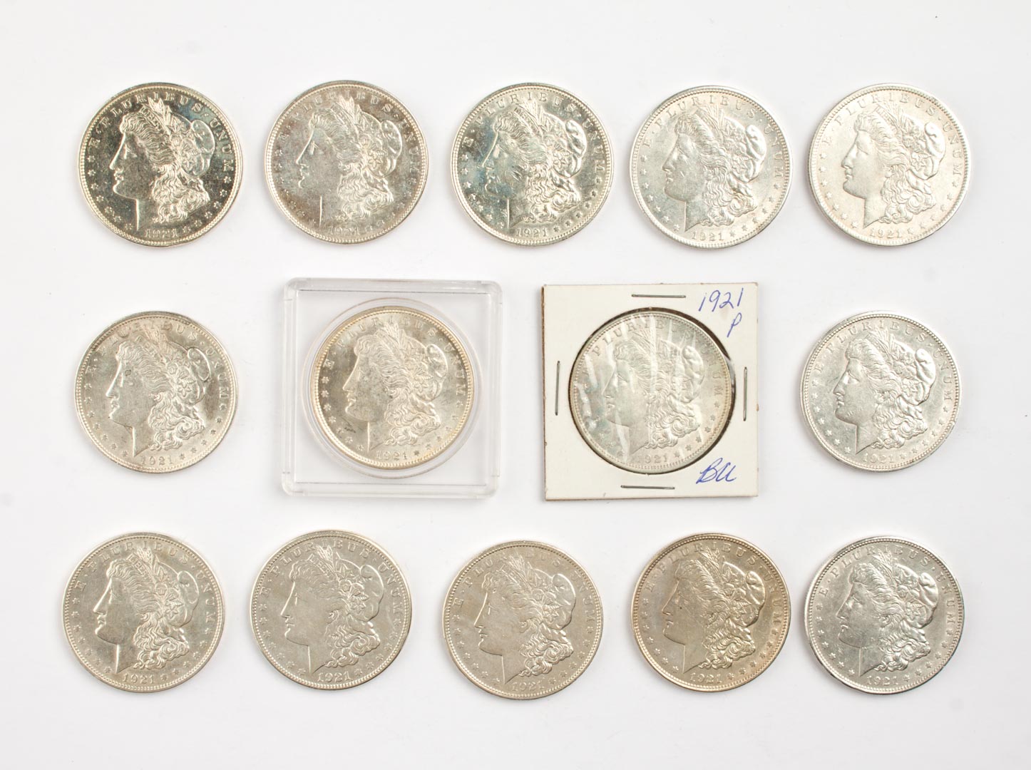 Appraisal: Three U S Morgan type silver dollars comprising thirteen MS-