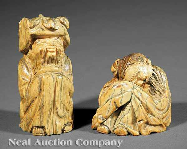 Appraisal: Two Chinese Ming-Style Carved and Stained Ivory Figures of Sages