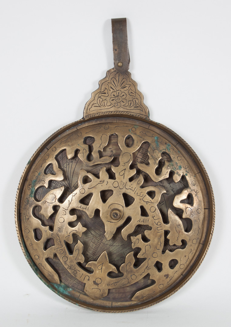 Appraisal: Islamic etched brass astrolabe early th century three-part brass instrument