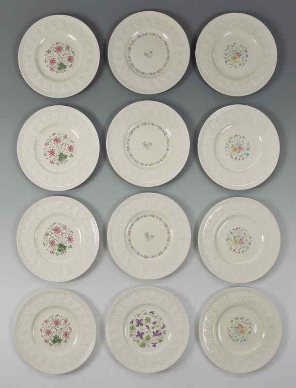 Appraisal: SET OF WEDGWOOD EMBOSSED QUEENSWARE SERVICE PLATES Embossed flower design