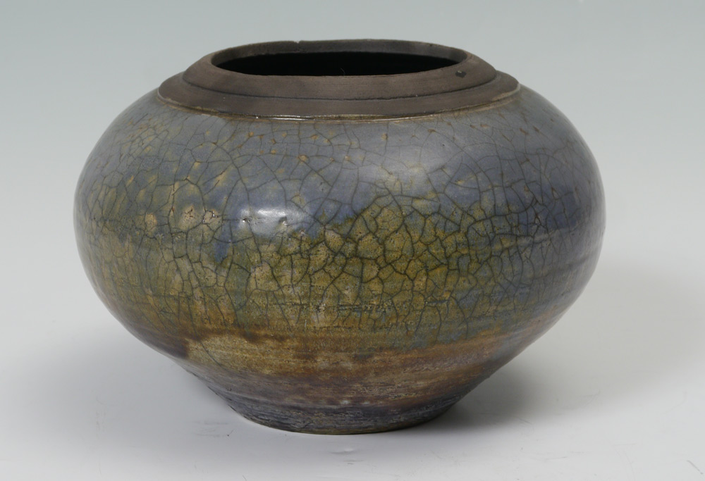 Appraisal: CONTEMPORARY STUDIO RAKU POTTERY VASE Illegibly signed Measures approx ''