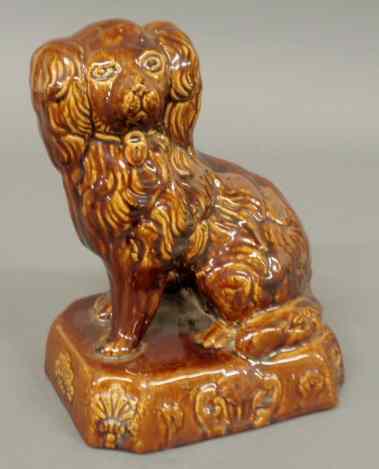 Appraisal: Bennington pottery seated spaniel th c h x w x