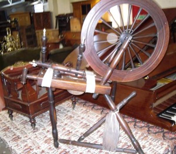 Appraisal: A Welsh oak spinning wheel