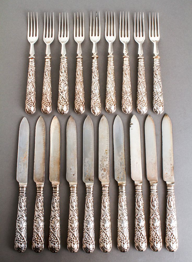 Appraisal: Silver Handled Grape Motif Fish Forks Knives Silver repousse handled