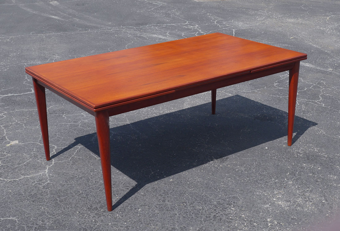 Appraisal: NIELS MOLLER TEAK EXTENSION DINING TABLE Classic Danish mid-century design