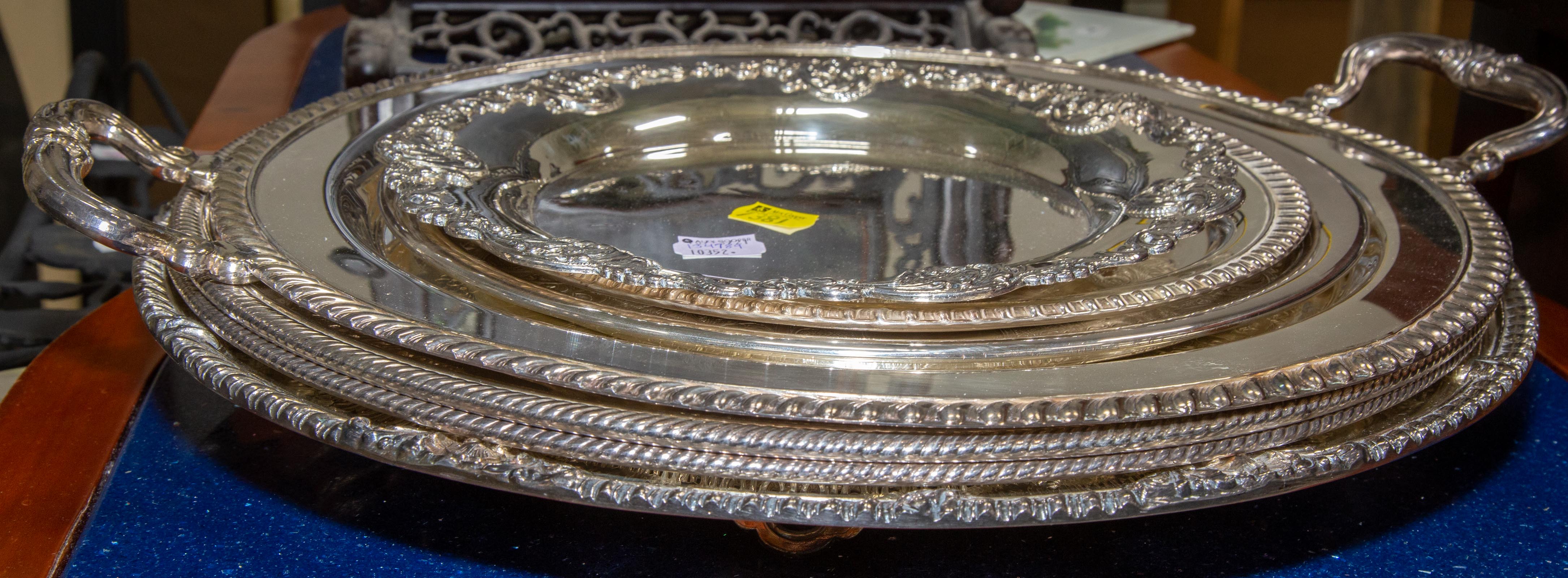 Appraisal: SEVEN SILVER PLATED CIRCULAR SERVING PLATTERS in to in Diam