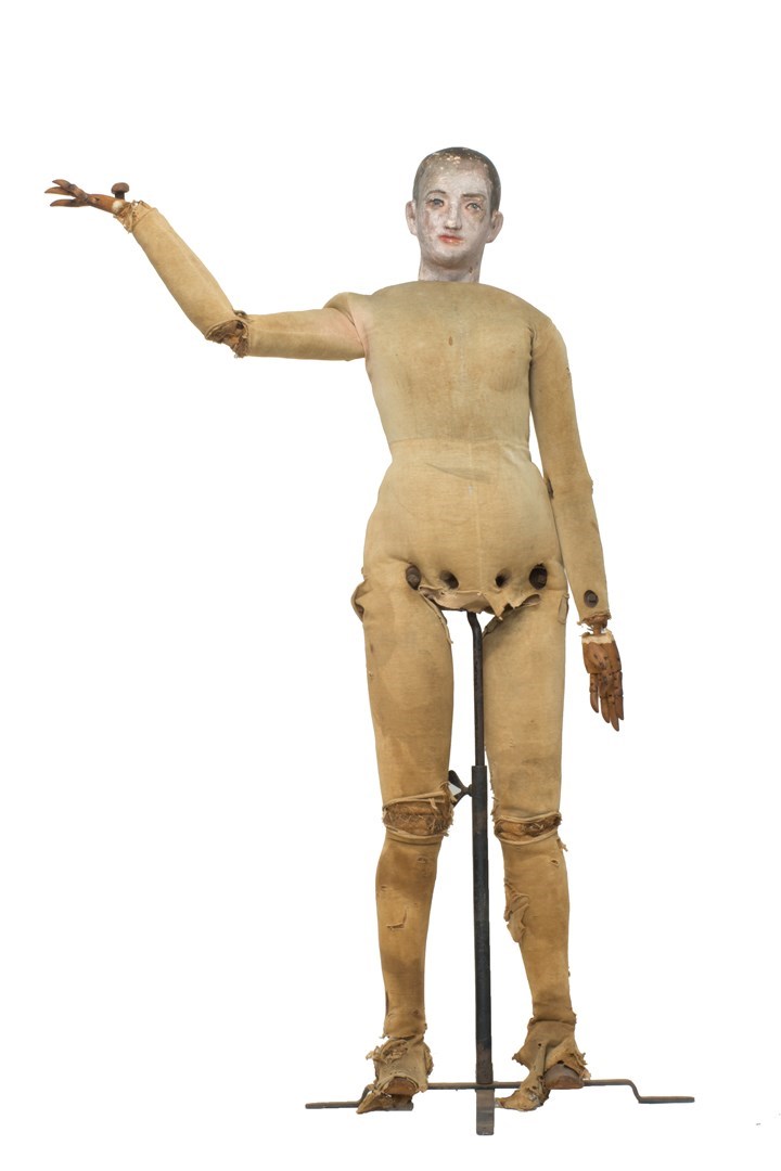 Appraisal: A German mannequin with polychrome painted papier mache head and