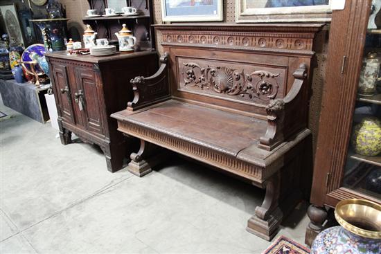 Appraisal: HALL BENCH Oak with a lift seat Back has dentil