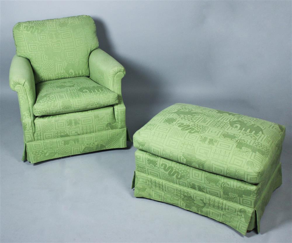 Appraisal: GREEN UPHOLSTERED ARM CHAIR WITH MATCHING OTTOMAN the straight crest