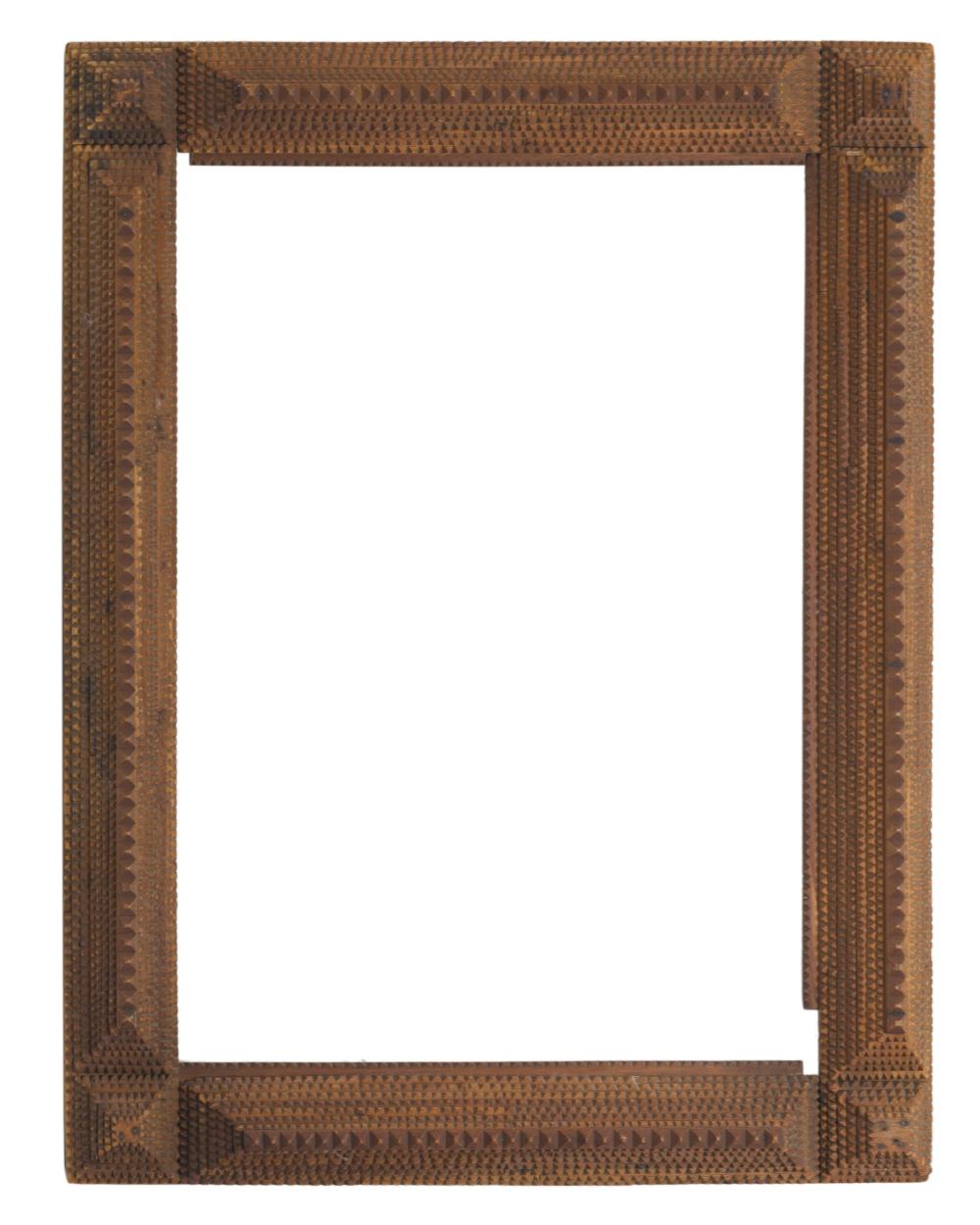 Appraisal: A chip-carved tramp art picture frame First-quarter th Century The