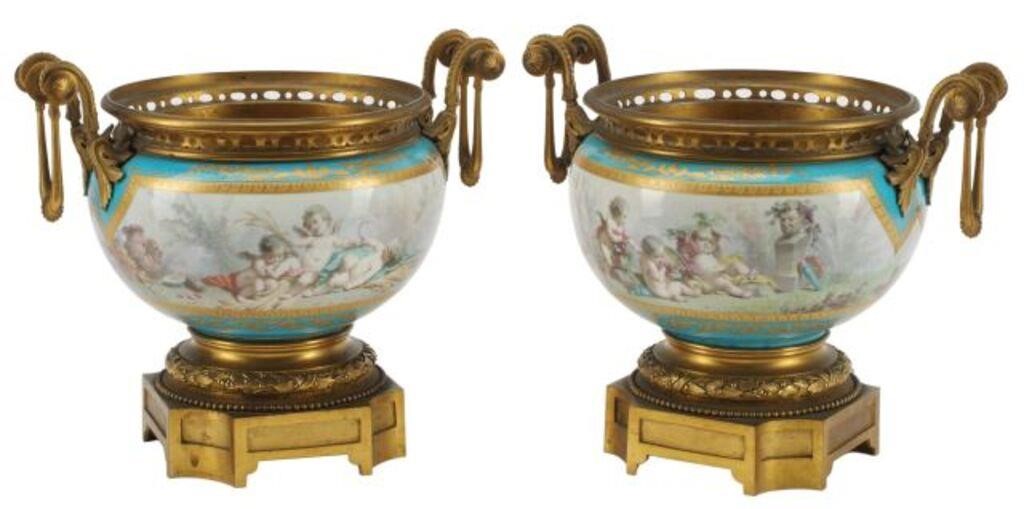 Appraisal: SEVRES STYLE ORMOLU-MOUNTED PORCELAIN CACHEPOTS pair Sevres style porcelain cachepots