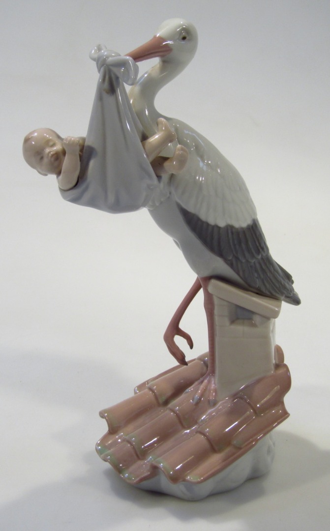 Appraisal: A modern Lladro figure group of a stork and baby