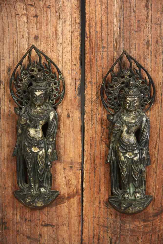 Appraisal: SCULPTURE - Pair of early Chinese gilded bronze deities mounted