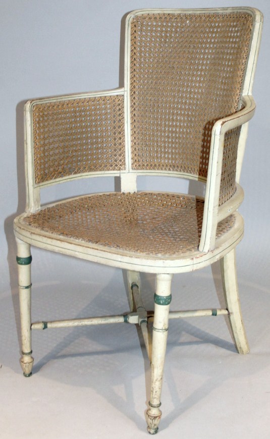 Appraisal: An early thC painted berger armchair with meshwork back arms