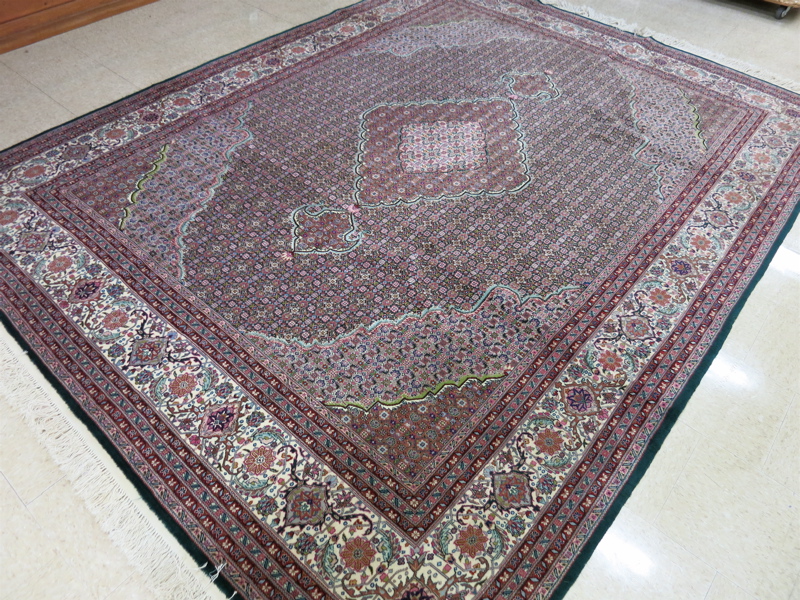 Appraisal: FINE SILK AND WOOL CARPET Sino-Persian Tabriz design central medallion