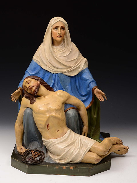 Appraisal: A CONTINENTAL CARVED WOOD AND POLYCHROME PAINTED GROUP of Mary