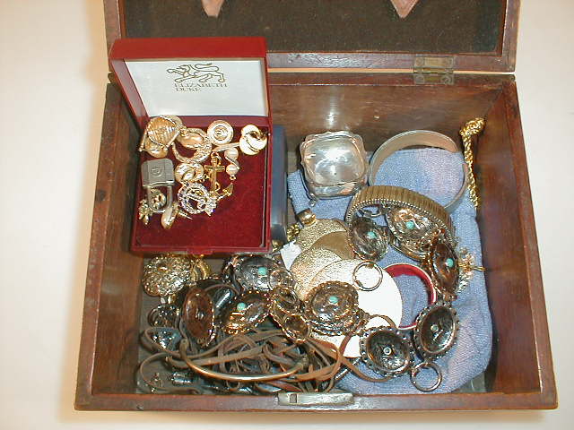 Appraisal: A wooden box with contents of trinket items and costume