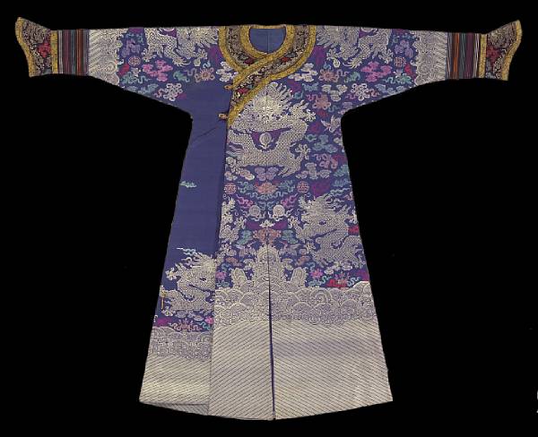 Appraisal: A blue silk ground brocade-woven dragon robe Late Qing Dynasty