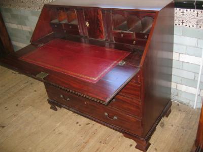 Appraisal: A GEORGE III MAHOGANY BUREAU the fallfront enclosing interior with