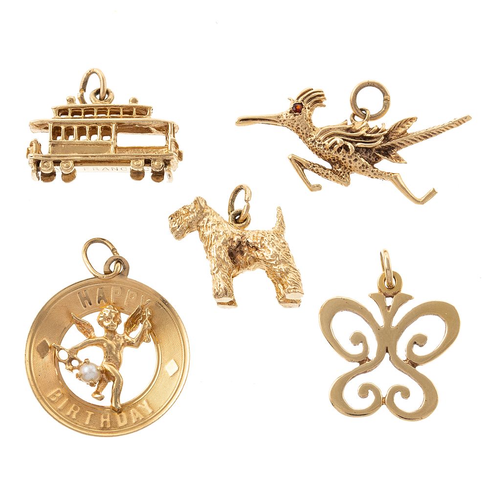 Appraisal: Five Charms in K Yellow Gold K yellow gold San