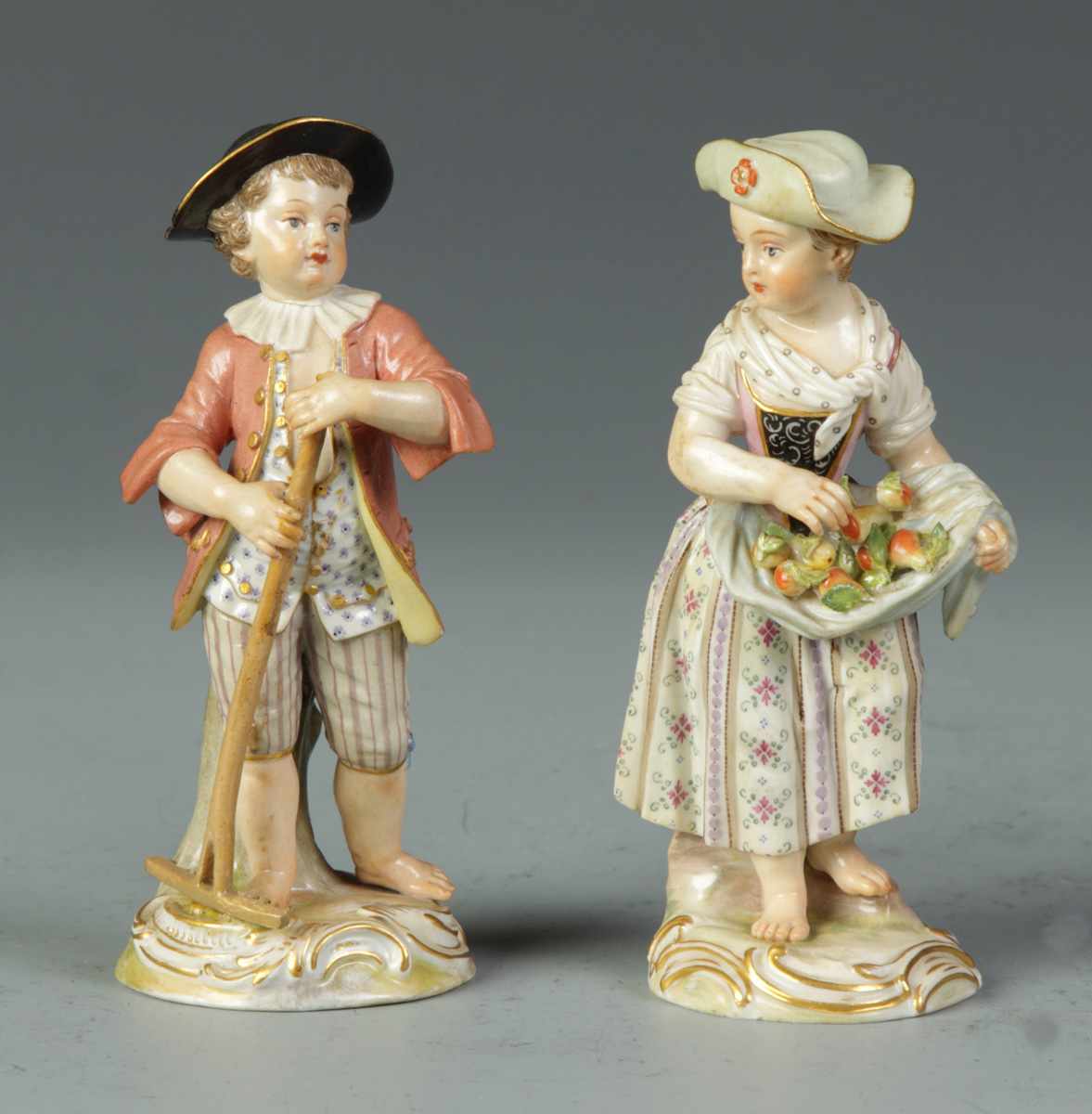 Appraisal: Meissen Figurines Boy w rake girl w fruit Some damage