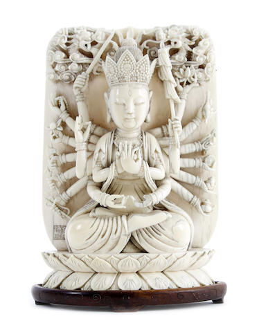 Appraisal: An ivory figure of a seated deity early th century