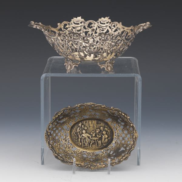 Appraisal: TWO SILVER RETICULATED DISHES One small bowl depicting tavern scene