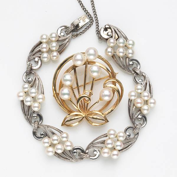 Appraisal: A cultured pearl and fourteen karat gold brooch Mikimoto together