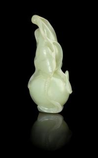 Appraisal: A Celadon Jade Gourd-Form Toggle carved wrapped in a leafy