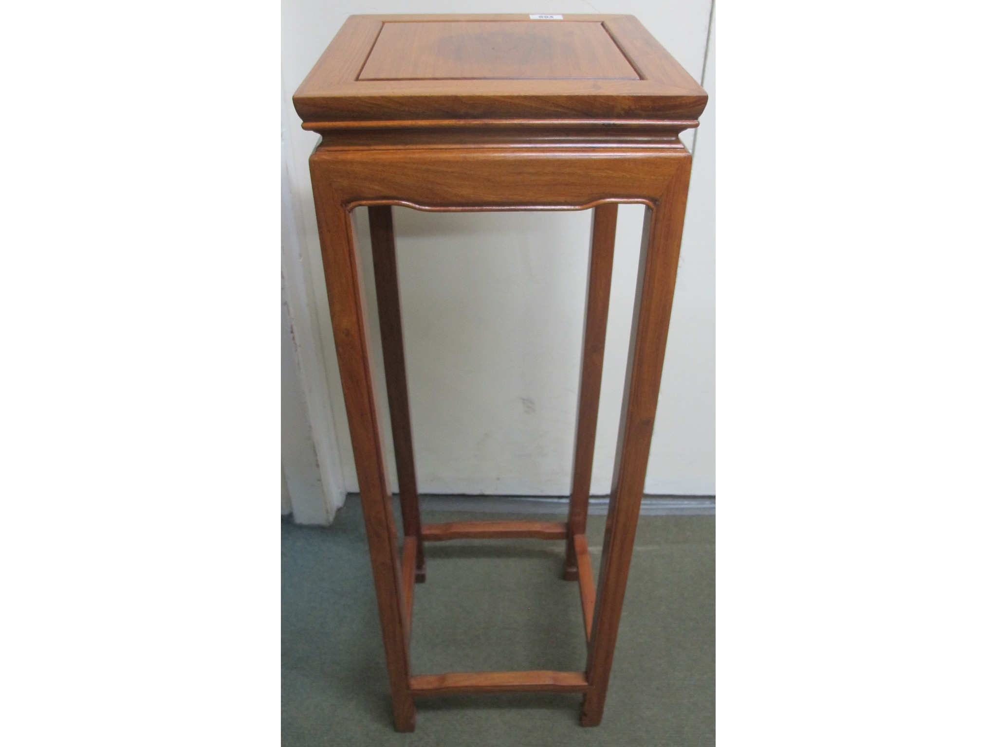 Appraisal: A teak plant stand