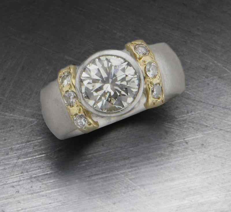 Appraisal: Platinum K gold and diamond ring having a central round