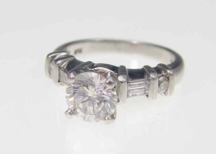 Appraisal: PLATINUM CTW DIAMOND ENGAGEMENT RING Sparkling round brilliant cut diamond