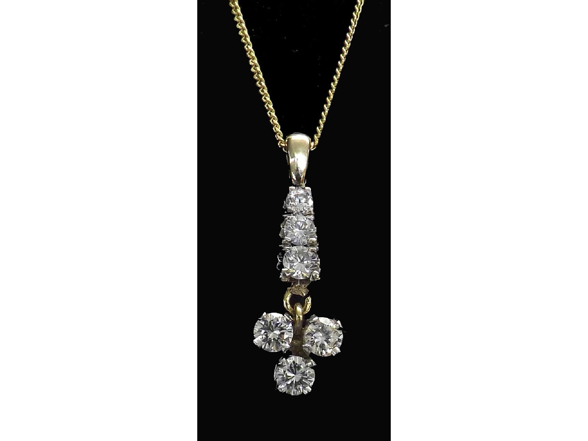 Appraisal: Diamond set six stone round brilliant-cut pendant set in ct