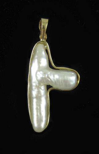 Appraisal: BAROQUE PEARL AND YELLOW GOLD PENDANT set with a large