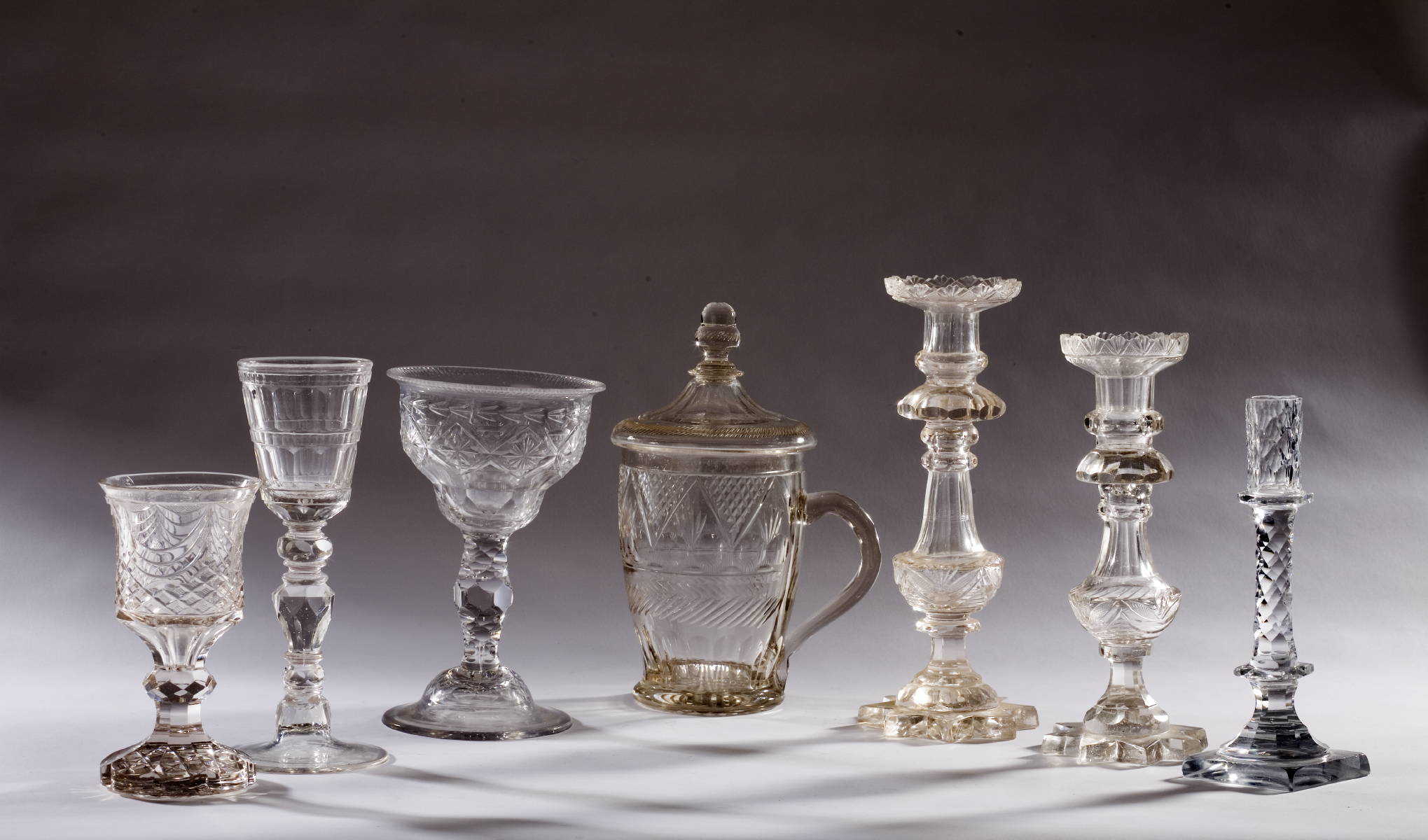 Appraisal: COLLECTION OF ANGLO-IRISH TABLE GLASS INCLUDING A COVERED POKEL AN