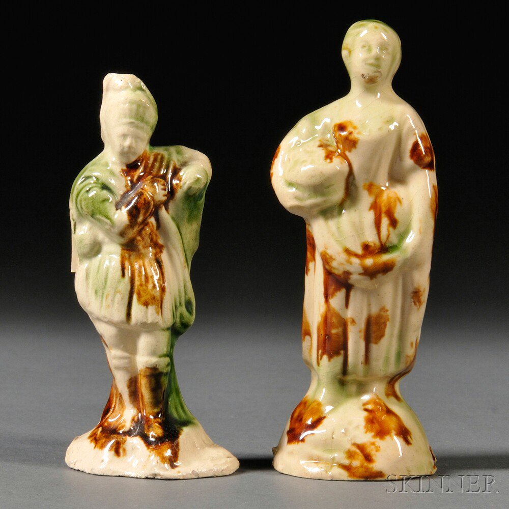 Appraisal: Two Staffordshire Cream-colored Earthenware Figures England c modeled as a