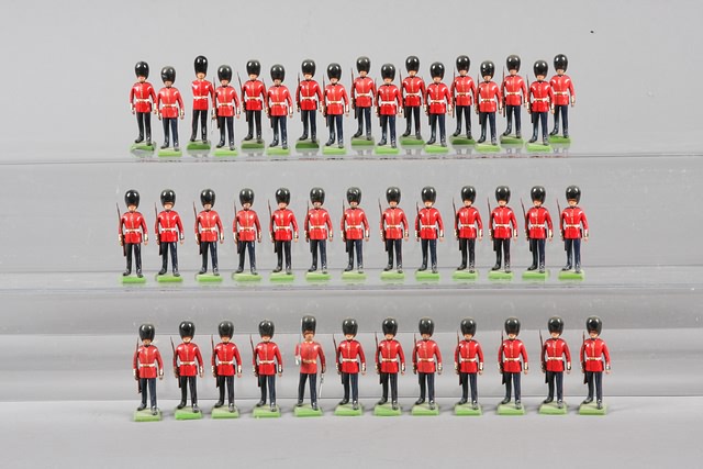 Appraisal: Lot of Britains new metal Scots Guards with metal bearskins