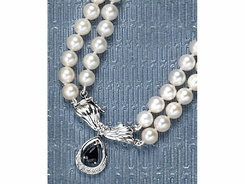 Appraisal: DOUBLE STRAND PEARLS Pearls measuring mm with k white gold