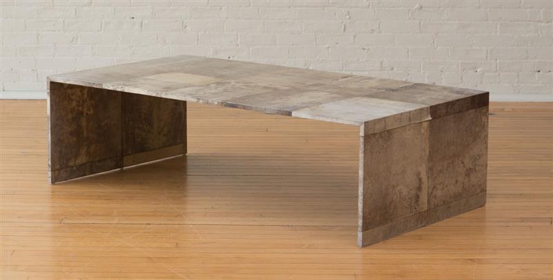 Appraisal: ART DECO STYLE PATINATED VELLUM-COVERED LOW TABLE x x in