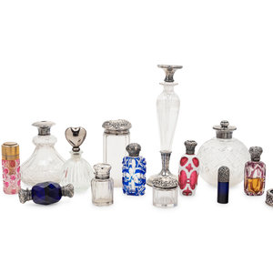 Appraisal: A Collection of Silver Mounted Glass Jars and Perfume Bottles