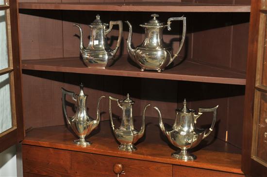 Appraisal: FIVE STERLING TEAPOTS All marked ''Sterling'' A Wallace pint pot