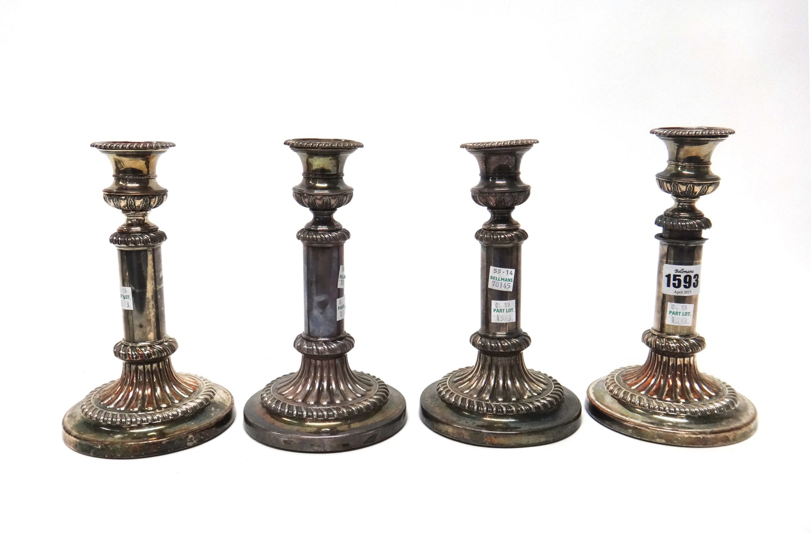 Appraisal: A set of four Sheffield plated telescopic action candlesticks each