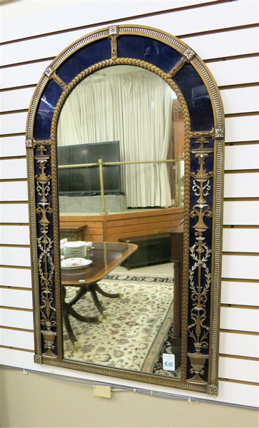 Appraisal: DECORATIVE ARCH-TOP WALL MIRROR H P Whitemore Fine Arts label