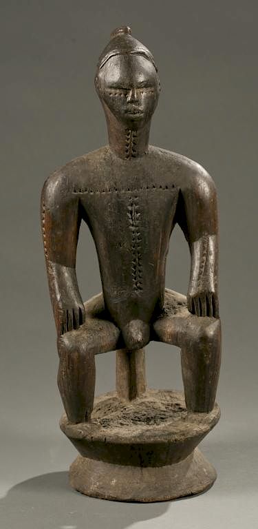 Appraisal: Bete seated male figure th century A seated male figure