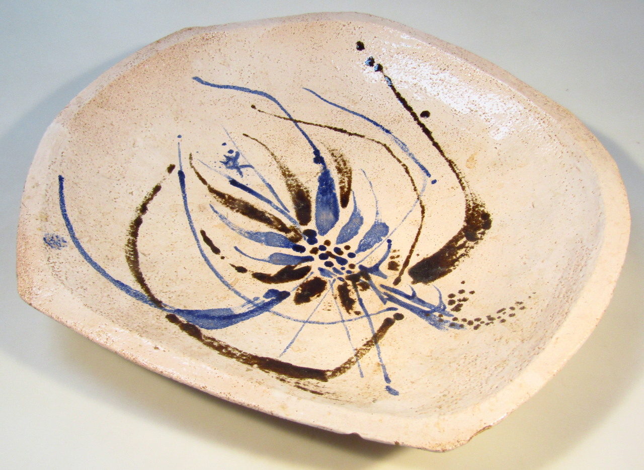 Appraisal: A hand thrown Studio pottery charger in blue and brown