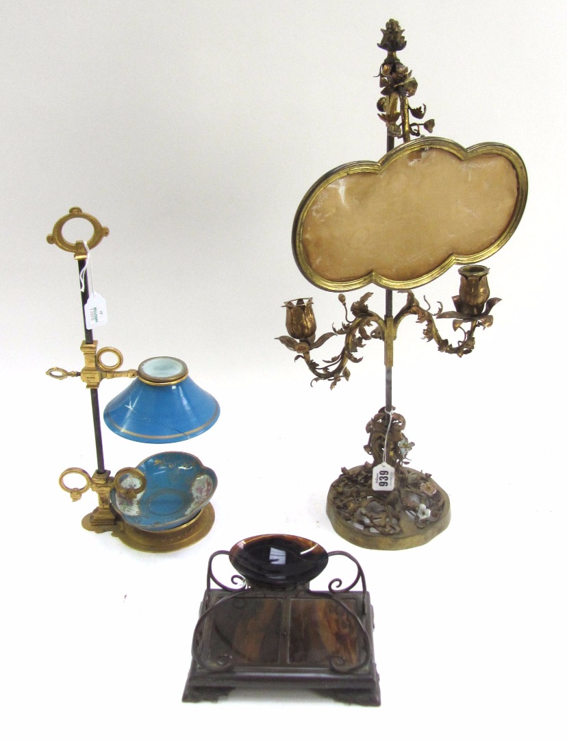 Appraisal: A French bronze bouillotte twin light candelabrum circa with foliate